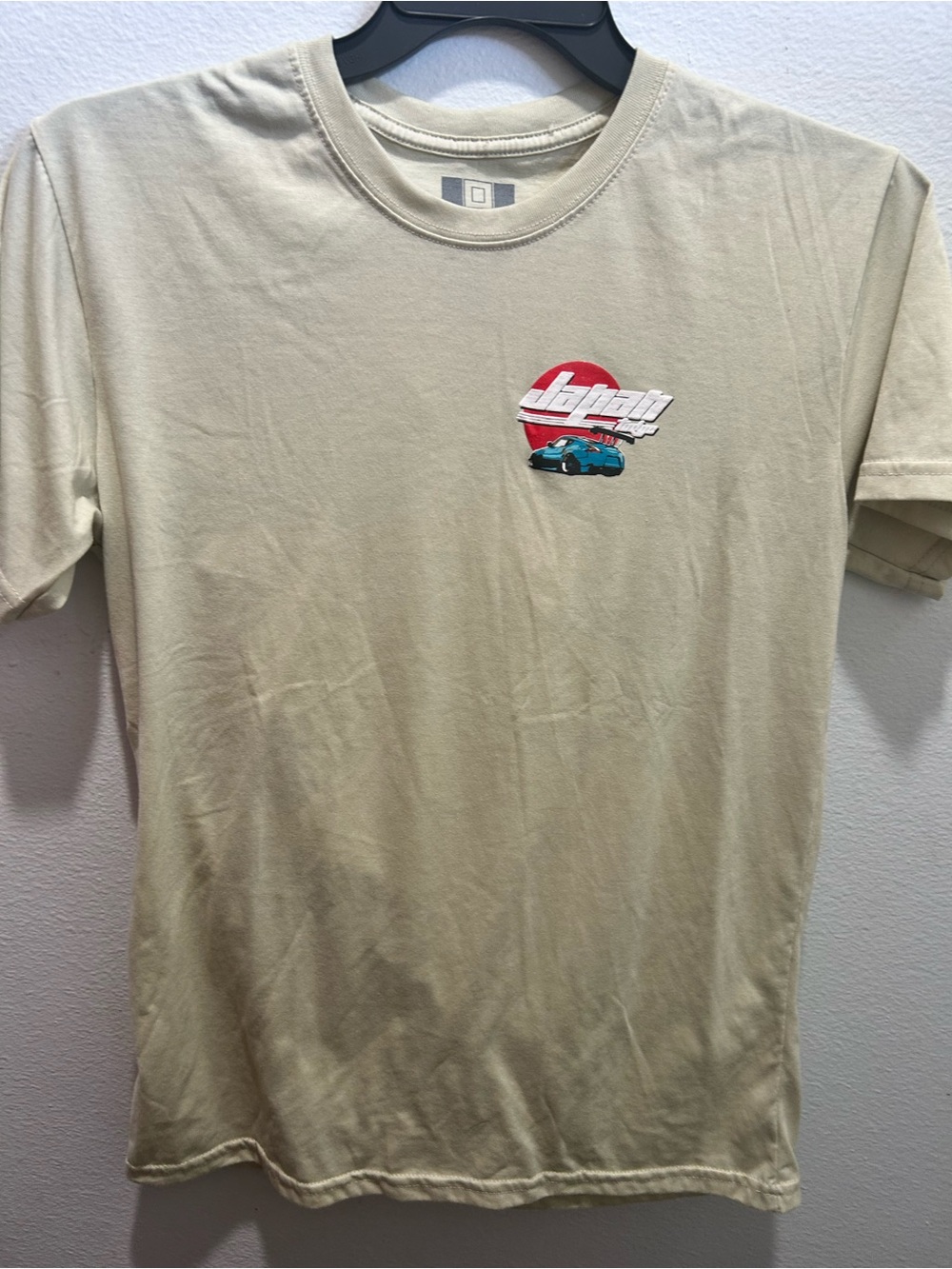 Light Tan Graphic Crewneck T-Shirt with Retro Car Motif